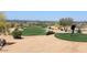 Scenic golf course with a golfer teeing off, surrounded by desert landscape at 10335 E Morning Star Dr, Scottsdale, AZ 85255