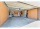 Spacious garage with built-in storage cabinets provides ample space for vehicles and organizational needs at 12820 W La Vina Dr, Sun City West, AZ 85375