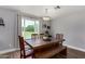 Charming dining room with rustic wooden table, bench seating, and natural light at 1551 E Longhorn Dr, Chandler, AZ 85286