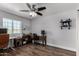 Dedicated office space with hardwood floors, large window, neutral paint, and two vintage desks at 1551 E Longhorn Dr, Chandler, AZ 85286