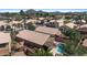 Aerial view of home featuring a swimming pool, covered patio and lush landscaping at 17424 N 1St Ave, Phoenix, AZ 85023