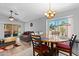 Open concept eat-in kitchen with a dining area and slider doors leading to the patio at 17424 N 1St Ave, Phoenix, AZ 85023