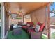Covered patio offering a ceiling fan, TV and ample seating, perfect for outdoor entertainment at 17424 N 1St Ave, Phoenix, AZ 85023