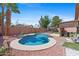 Beautiful backyard pool surrounded by desert landscape and brick privacy wall at 17424 N 1St Ave, Phoenix, AZ 85023