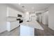 Modern kitchen showcasing granite countertops, and stainless steel appliances at 18219 W Daley Ln, Surprise, AZ 85387