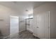 Well-lit bathroom features a glass shower enclosure and a tile floor at 18236 W Daley Ln, Surprise, AZ 85387