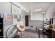 A cute bedroom with a chair, desk, and skylight providing natural light at 2040 S Longmore -- # 9, Mesa, AZ 85202