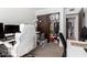 Home office space featuring a closet, desk, drawers and a comfortable rolling chair at 2040 S Longmore -- # 9, Mesa, AZ 85202