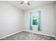 Empty bedroom with carpet and a window at 21093 N Willow Rd, Maricopa, AZ 85138