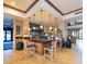 A cozy coffee bar with granite counters and wood trim, perfect for gathering and socializing at 21093 N Willow Rd, Maricopa, AZ 85138