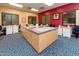 Bright craft room with sewing machines, large tables, and comfortable seating at 21093 N Willow Rd, Maricopa, AZ 85138