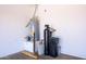 Utility and storage room with water heater, water filtration system and storage for home maintenance at 21093 N Willow Rd, Maricopa, AZ 85138