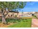 Enjoy a day by the pool with ample green space and comfortable lounge chairs available for residents at 2219 E Catalina Dr, Phoenix, AZ 85016