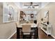 Comfortable dining room with view to the kitchen featuring seating for four with natural light at 2219 E Catalina Dr, Phoenix, AZ 85016
