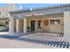 Charming home exterior featuring a covered carport with stylish beams and an arched window, offering curb appeal at 2219 E Catalina Dr, Phoenix, AZ 85016