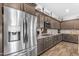 Well-equipped kitchen featuring stainless steel appliances and ample cabinet space at 22977 E Desert Spoon Dr, Queen Creek, AZ 85142