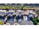 Expansive aerial shot of upscale neighborhood featuring well-maintained homes and beautiful streetscapes at 24042 N 170Th Ln, Surprise, AZ 85387