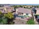 Inviting backyard with a pool and patio area, perfect for outdoor entertaining and relaxation at 24042 N 170Th Ln, Surprise, AZ 85387