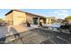 Entertainer's backyard with a built-in BBQ, outdoor seating, pool, and desert landscaping at 24042 N 170Th Ln, Surprise, AZ 85387