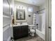 Clean bathroom with a vanity, framed mirror, and a shower-tub combination at 24042 N 170Th Ln, Surprise, AZ 85387