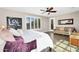 A cozy bedroom with a comfortable bed, stylish decor, and plenty of natural light at 24042 N 170Th Ln, Surprise, AZ 85387