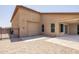 Home exterior with a gated parking area, patio, and convenient garage access at 24042 N 170Th Ln, Surprise, AZ 85387