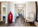 Inviting hallway featuring decorative accents, stylish flooring, and elegant furnishings at 24042 N 170Th Ln, Surprise, AZ 85387