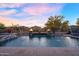 Tranquil pool with elegant water features and desert views at 24042 N 170Th Ln, Surprise, AZ 85387