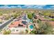 Residential neighborhood with solar panels, pools, and lush landscaping, offering a comfortable and modern living environment at 2425 W Woburn Ln, Phoenix, AZ 85085
