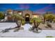 Inviting home featuring manicured landscaping, a stately entrance, and multi-car garage at 2425 W Woburn Ln, Phoenix, AZ 85085