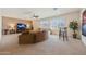 A spacious living room featuring lots of natural light at 2425 W Woburn Ln, Phoenix, AZ 85085