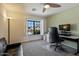 Office featuring carpet, a desk and chair with lots of room to work and natural light at 2425 W Woburn Ln, Phoenix, AZ 85085