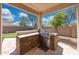 Well-equipped outdoor kitchen boasts a built-in grill and ample counter space at 2425 W Woburn Ln, Phoenix, AZ 85085