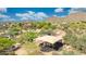 Community playground with shade structure, set against a backdrop of scenic mountain views and lush landscaping at 2425 W Woburn Ln, Phoenix, AZ 85085