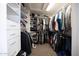 Spacious walk-in closet with custom shelving and hanging storage at 2425 W Woburn Ln, Phoenix, AZ 85085