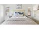 Comfortable bedroom with plush bedding, decorative pillows, and bedside tables with lamps at 2768 W Jasper Butte Dr, San Tan Valley, AZ 85144