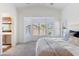 Bright bedroom with a bay window, neutral walls, and plush carpet at 2768 W Jasper Butte Dr, San Tan Valley, AZ 85144