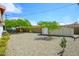 Large backyard featuring desert landscaping and a storage shed for tools and equipment at 2901 W Mandalay Ln, Phoenix, AZ 85053