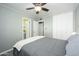 Bedroom featuring wood-look flooring, neutral paint and ceiling fan at 2901 W Mandalay Ln, Phoenix, AZ 85053