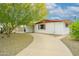 Exterior of home with desert landscaping, covered parking, and inviting walkway at 2901 W Mandalay Ln, Phoenix, AZ 85053