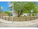 Corner lot featuring desert landscaping, mature trees, and a rustic fence at 2901 W Mandalay Ln, Phoenix, AZ 85053