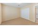 Bedroom featuring sliding door closet and view to another room at 2935 W Kristal Way, Phoenix, AZ 85027