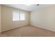 Cozy bedroom with carpet and natural light streaming in through shuttered windows at 2935 W Kristal Way, Phoenix, AZ 85027
