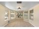 Sunny breakfast nook featuring large windows, neutral walls, and tiled floors at 2935 W Kristal Way, Phoenix, AZ 85027