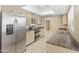 Well-lit kitchen with stainless steel appliances and abundant cabinet space at 2935 W Kristal Way, Phoenix, AZ 85027