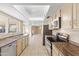 Bright kitchen features tile floors, stainless steel appliances, and view to adjoining rooms at 2935 W Kristal Way, Phoenix, AZ 85027