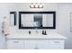 Bathroom vanity features white cabinets, white countertop, and large mirror at 3027 W Wescott Dr, Phoenix, AZ 85027