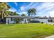 Charming single-story home featuring a well-manicured lawn, desert landscaping, and a two-car garage at 3027 W Wescott Dr, Phoenix, AZ 85027