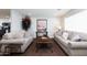 Comfortable living room featuring neutral tones, wood flooring, and lots of space for entertaining at 3027 W Wescott Dr, Phoenix, AZ 85027