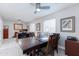 Office features ceiling fans, a large conference table and built in desk and cabinets at 3027 W Wescott Dr, Phoenix, AZ 85027